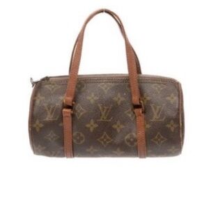 Authentic Louis Vuitton Mini fits everything you need sling on shoulder or wrist